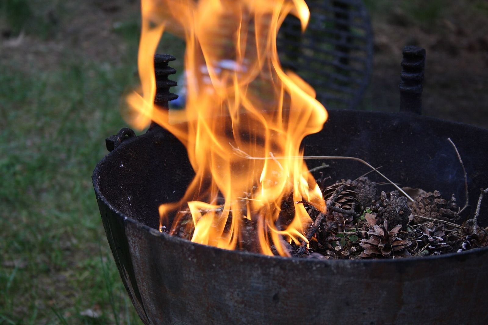 Preparing grill for grilling, grill with flames and cones near hostákov, vladislav, třebíč district